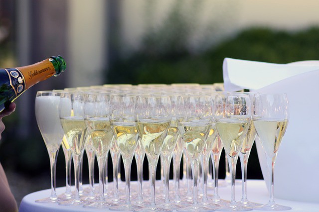 pouring champagne for a wedding toast